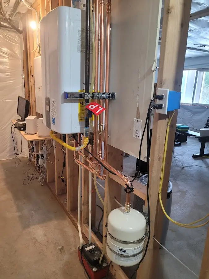 Licensed plumber repairing a kitchen sink in Dunean